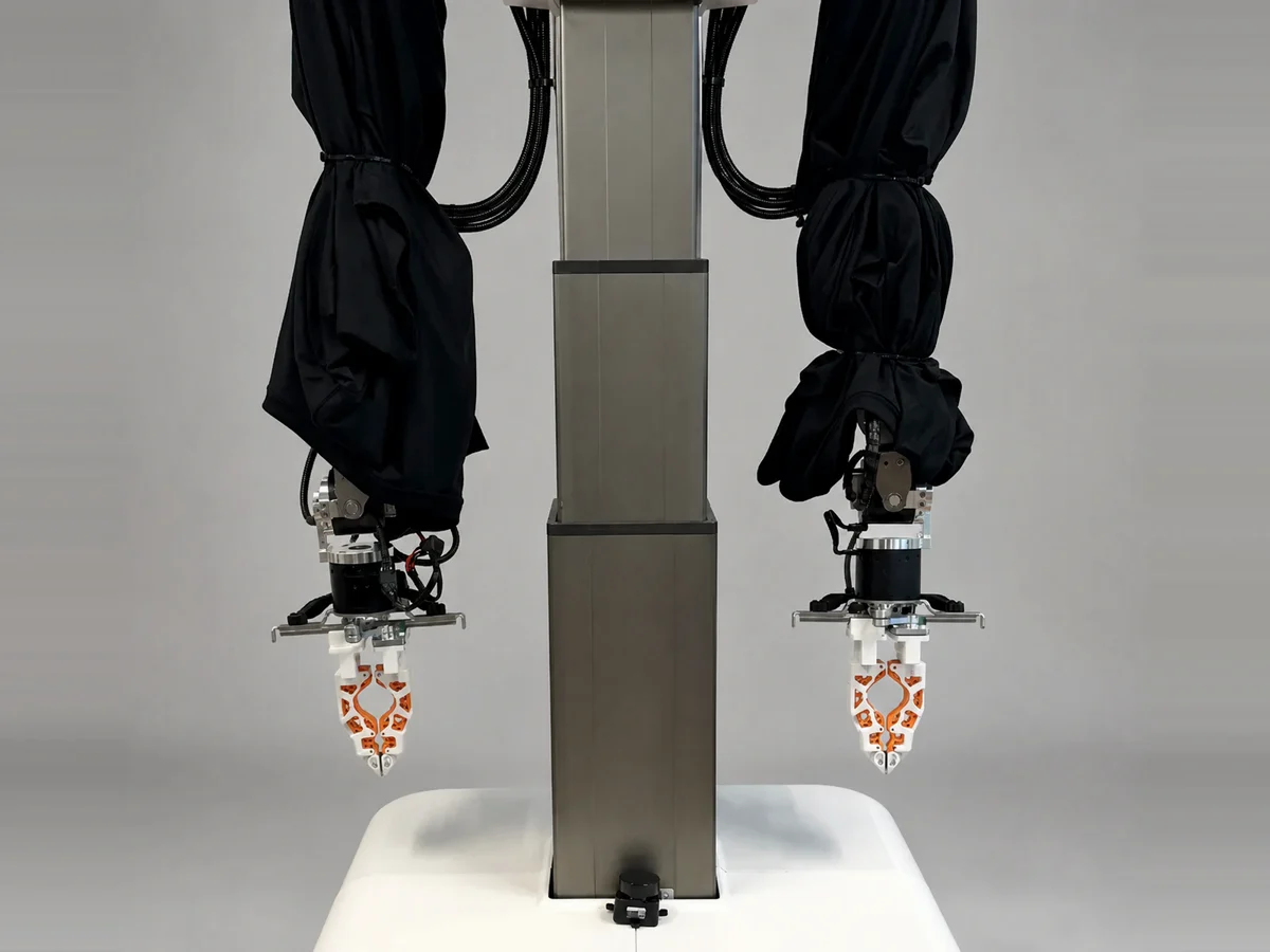 The two arms, grippers and vertical lift of the robot